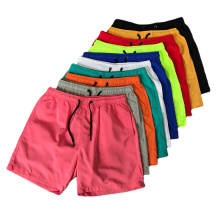 Fábrica Precio barato Hombres Plus Tamaño de verano Color sólido Beachwear al por mayor troncal Shorts de baño para hombres